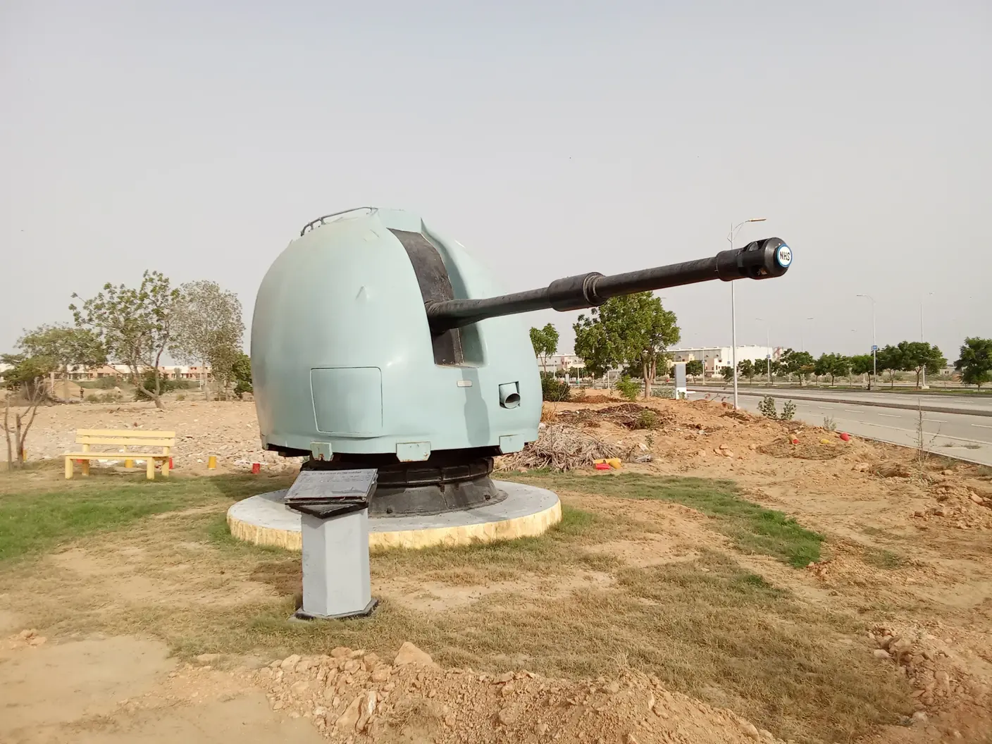 Naval gun monument at the entrance of NHS Mauripur